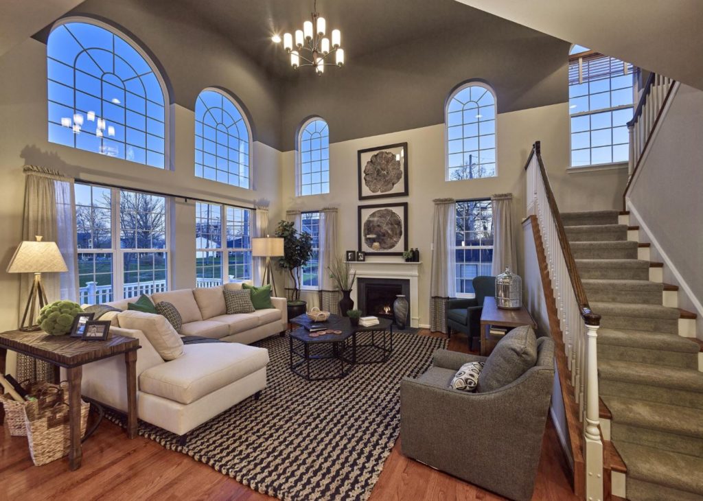 Gacek design group earthy traditional two story great room
